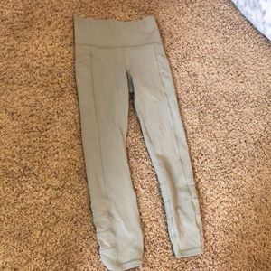 Athleta salutation stash pocket leggings